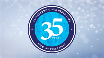 A blue circle logo with "35 Years" in the middle and the words "Safeguarding and protecting what matters most" around the circumference 