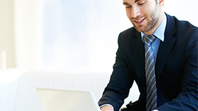 A young man working on his laptop